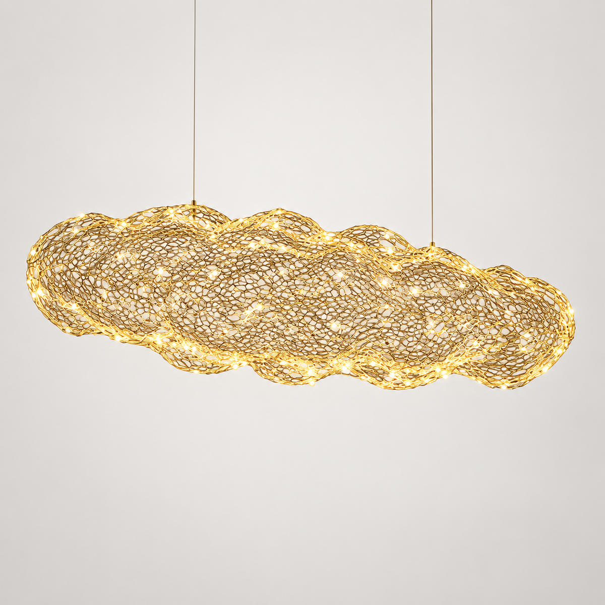Halo pendant showing the flowing gold mesh form; 45 cm model measures 45 by 30 by 19 cm